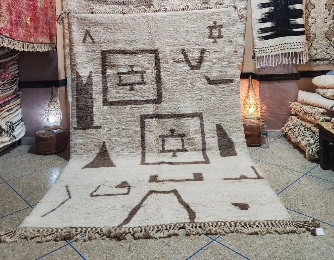 Ivory Beni Ourain rug with brown Amazigh geometric symbols and figures