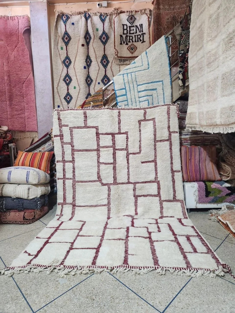Ivory contemporary rug with burgundy rectangular grid pattern