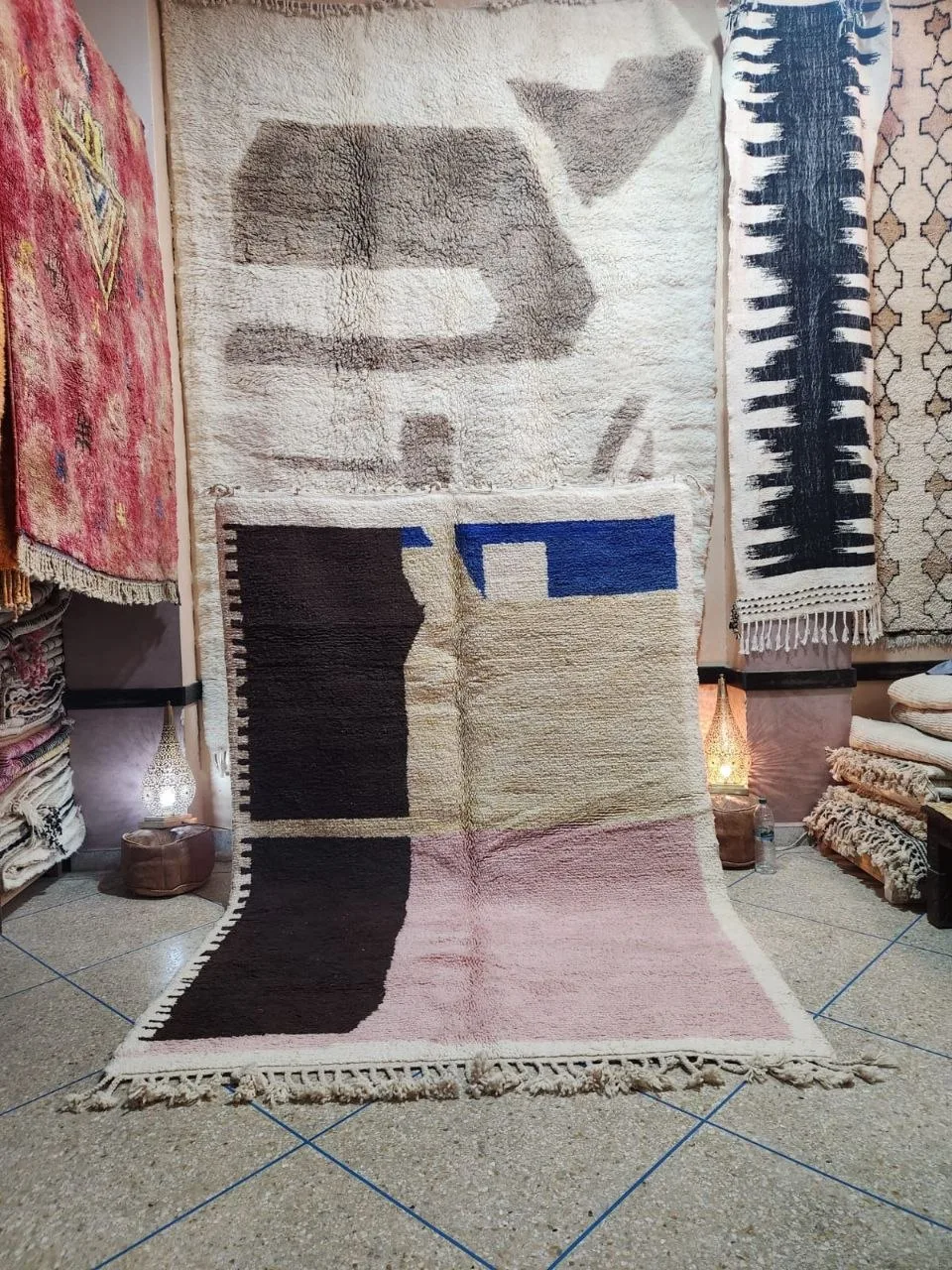 Abstract contemporary rug with dark brown, mauve and rose colour blocks on ivory