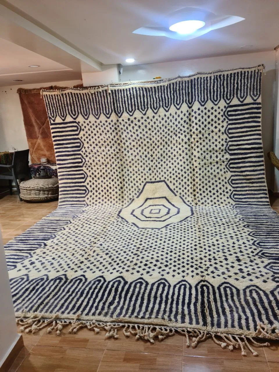 Large blue and white Mrirt rug with intricate geometric pattern
