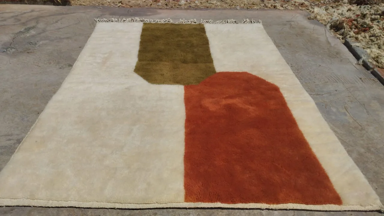 Rug laid flat in traditional Moroccan courtyard