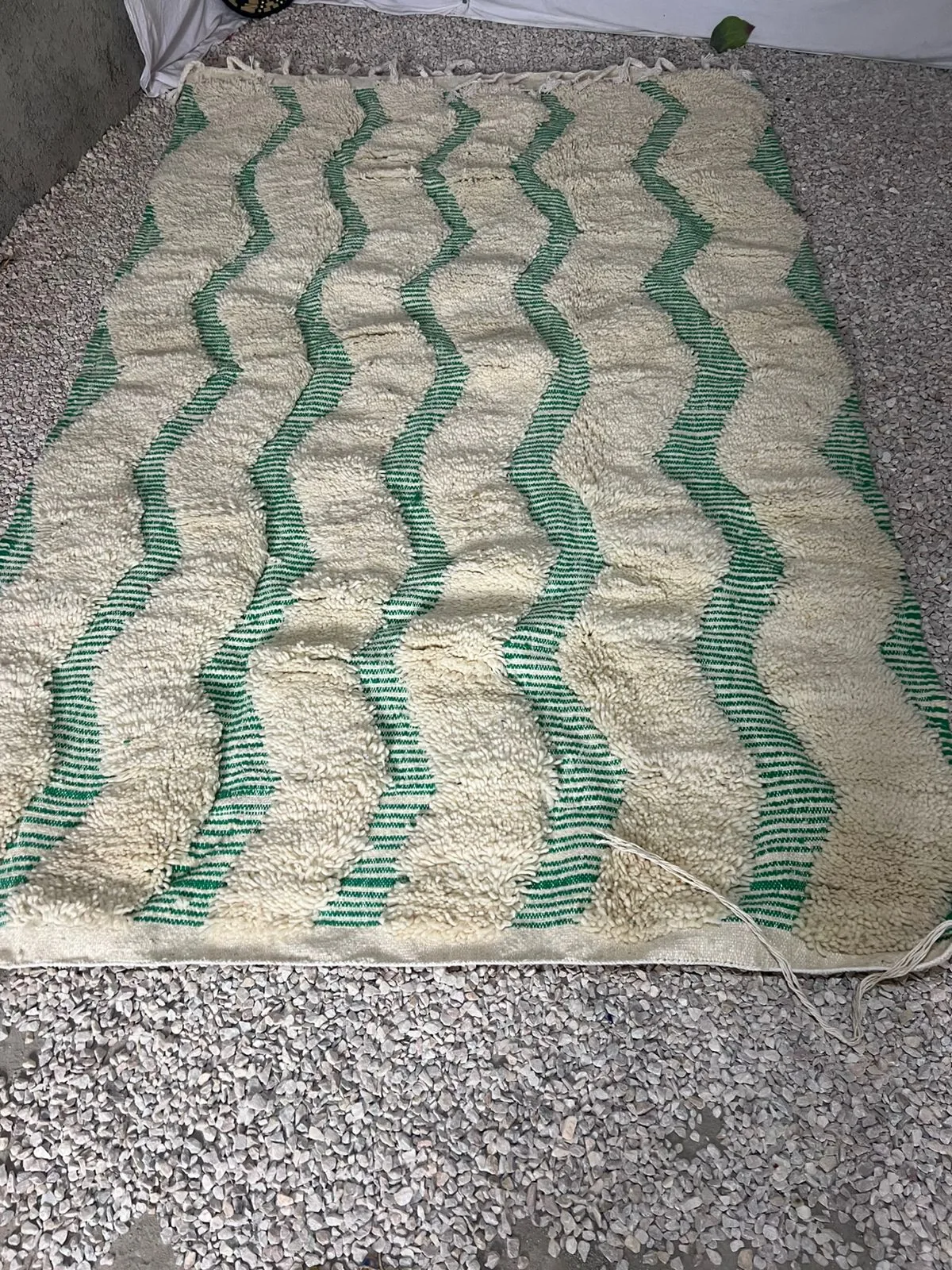 High-pile Beni Ourain rug in ivory and sage green with flowing horizontal wave stripe pattern