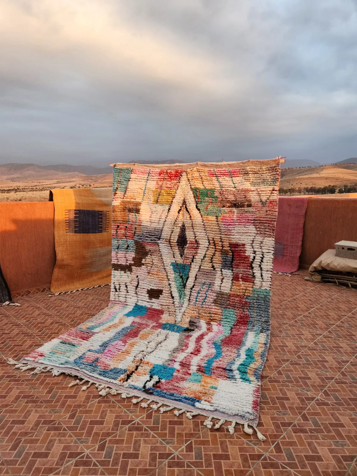 Bold diamond Boujaad in deep red and multicolor geometric field