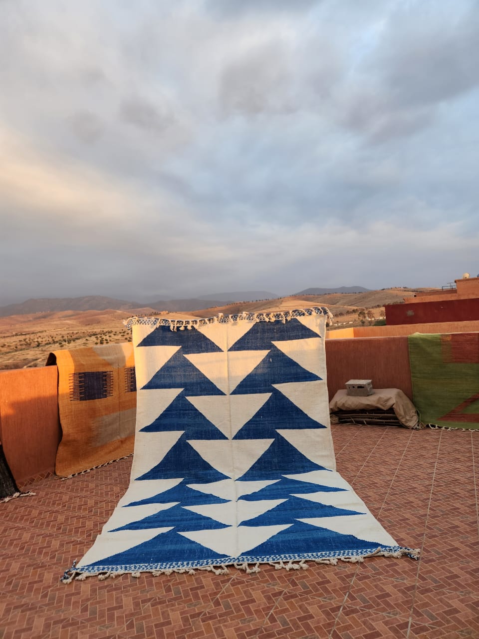 Flat-woven Kilim with bold indigo blue and ivory stacked triangle mountain forms