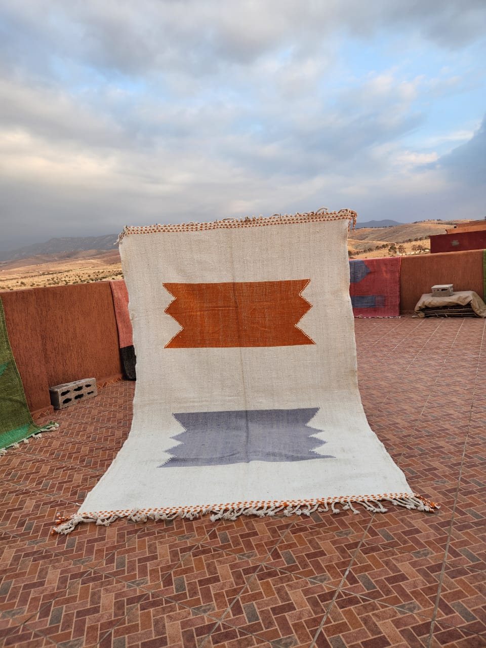 Ivory flat-woven Kilim with bold orange and grey geometric bands