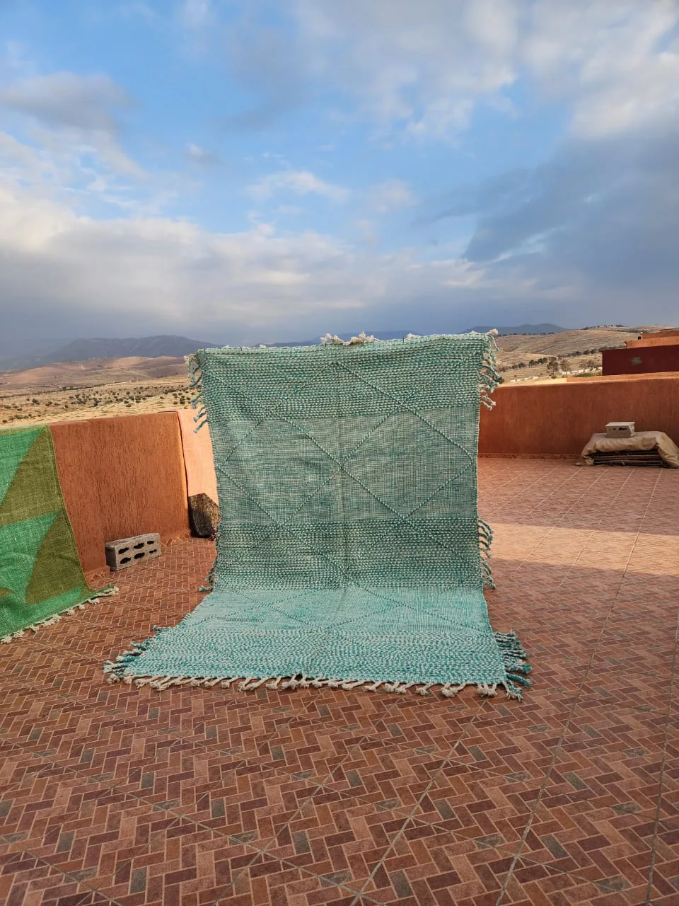 Deep teal flat-woven Kilim with precise ivory diamond lattice
