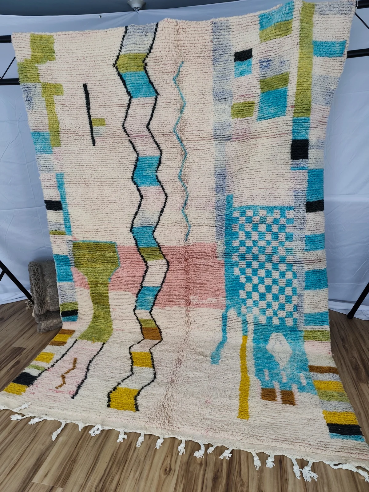 Abstract art Moroccan rug with turquoise, olive, pink and yellow color blocks on cream