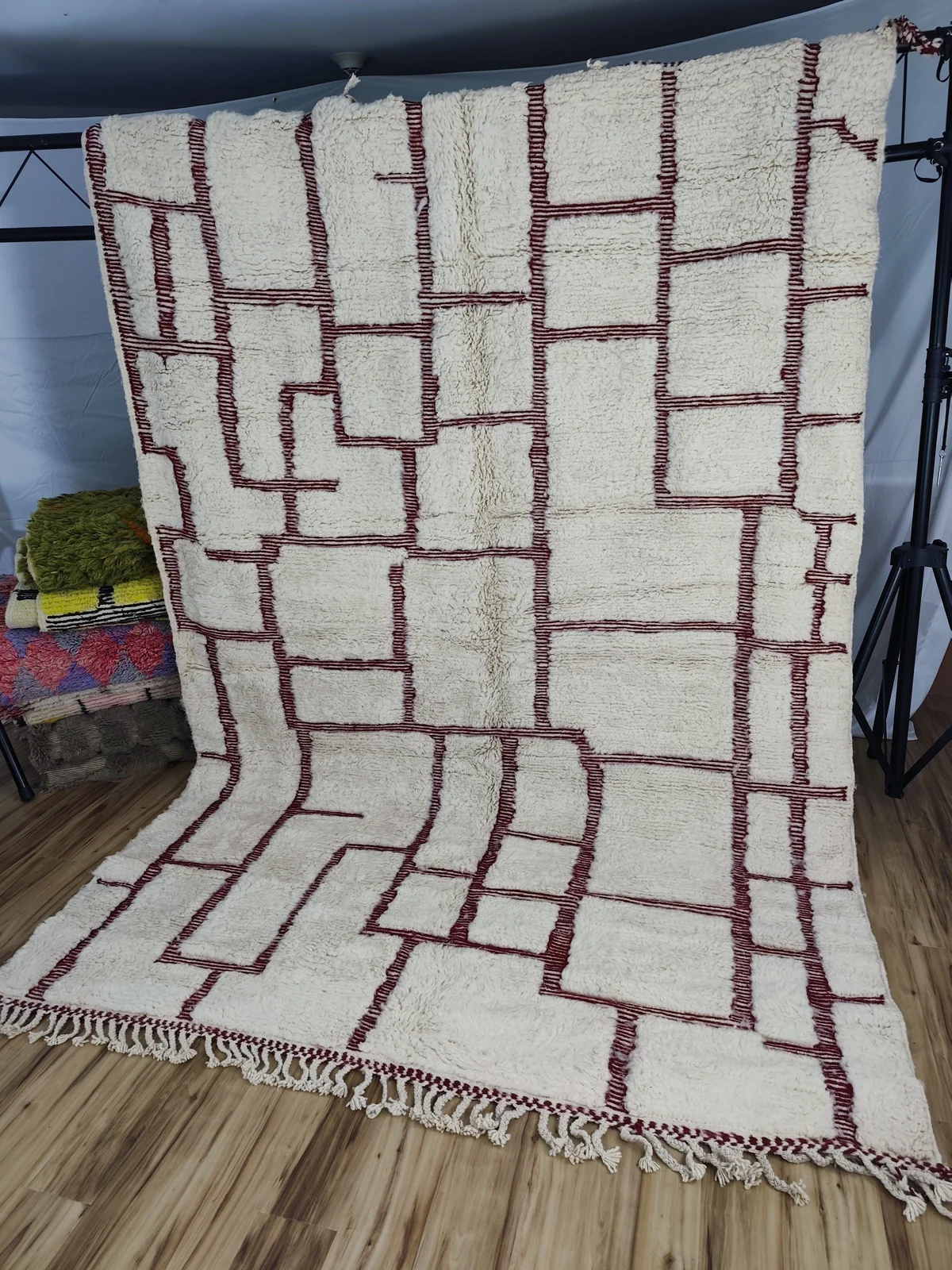 Contemporary Moroccan rug with a precise burgundy grid on ivory
