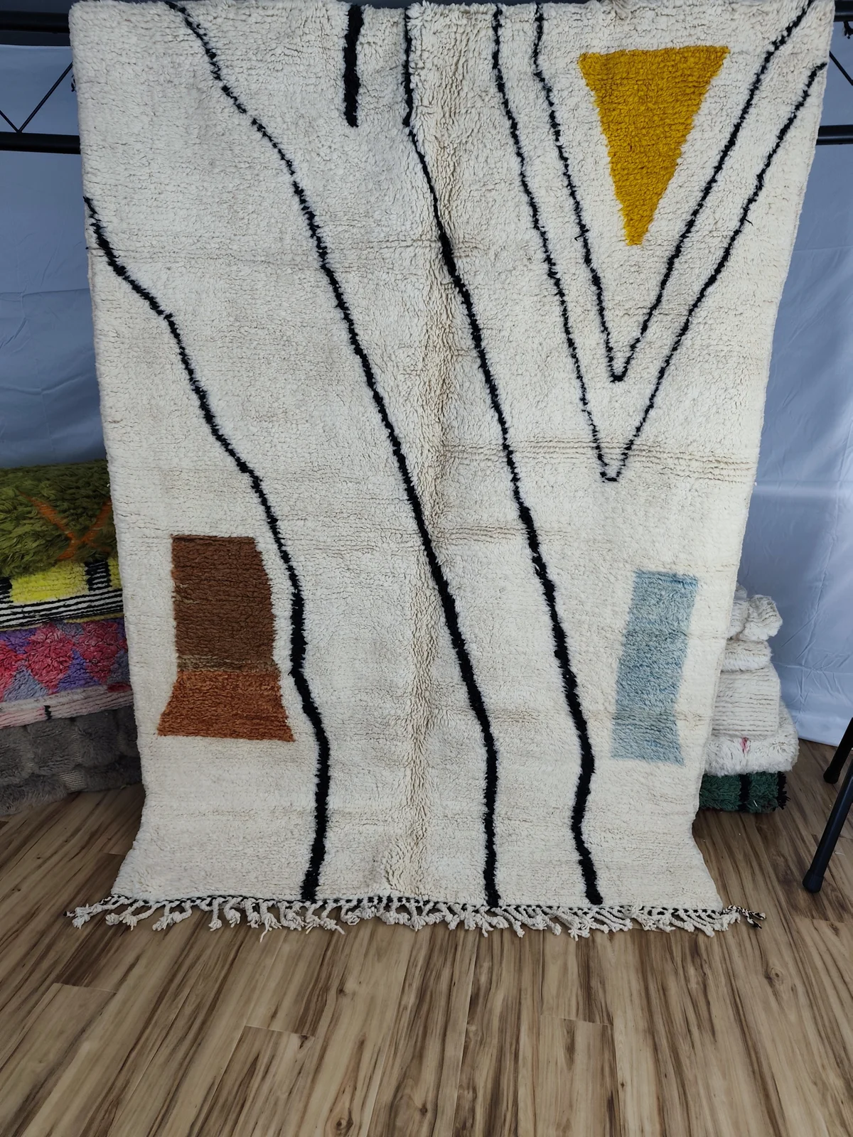 Warda — Contemporary Moroccan Rug, hung in studio