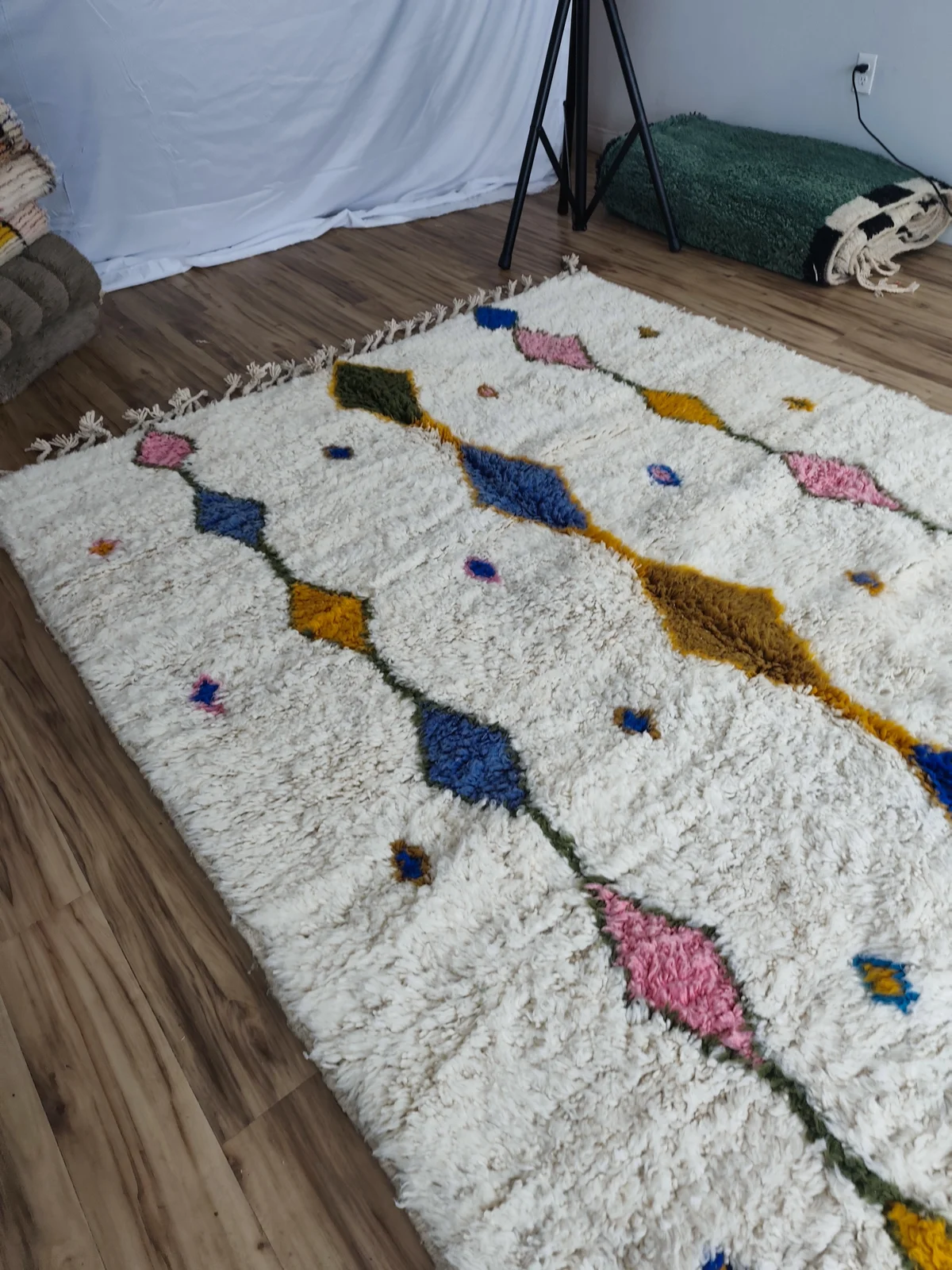 Rihab — Azilal Moroccan Rug, hung in studio