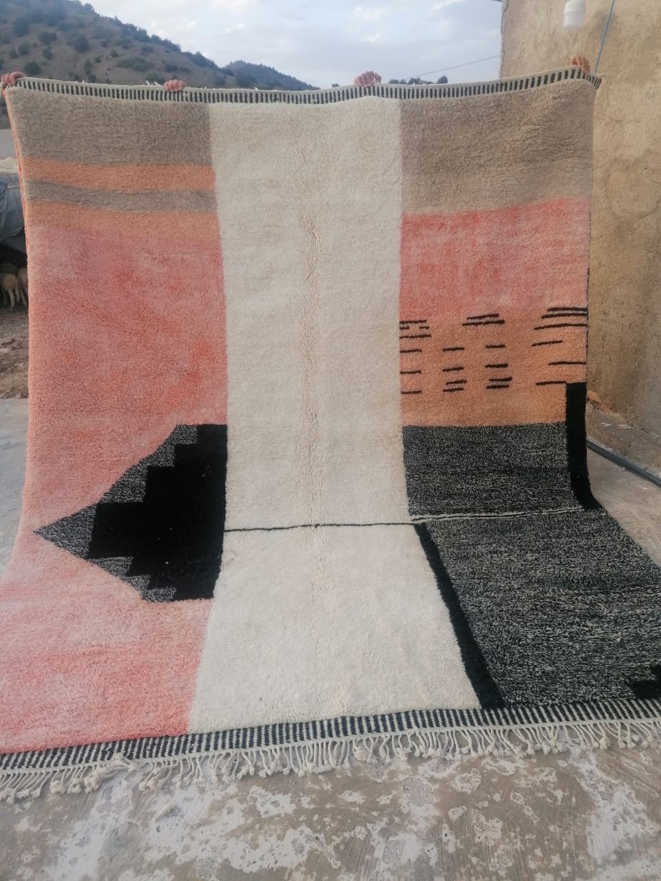 Moroccan rug with blush pink, ivory and charcoal abstract block composition and dash mark details
