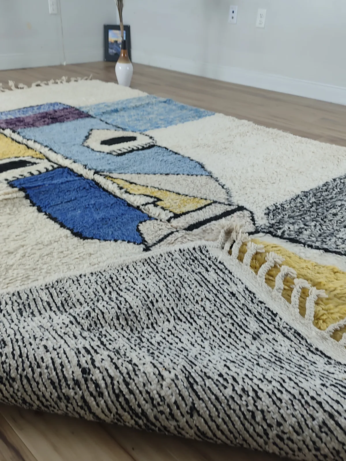 Picasso-inspired art Moroccan rug with abstract cubist face in cobalt blue, mustard yellow and charcoal grey
