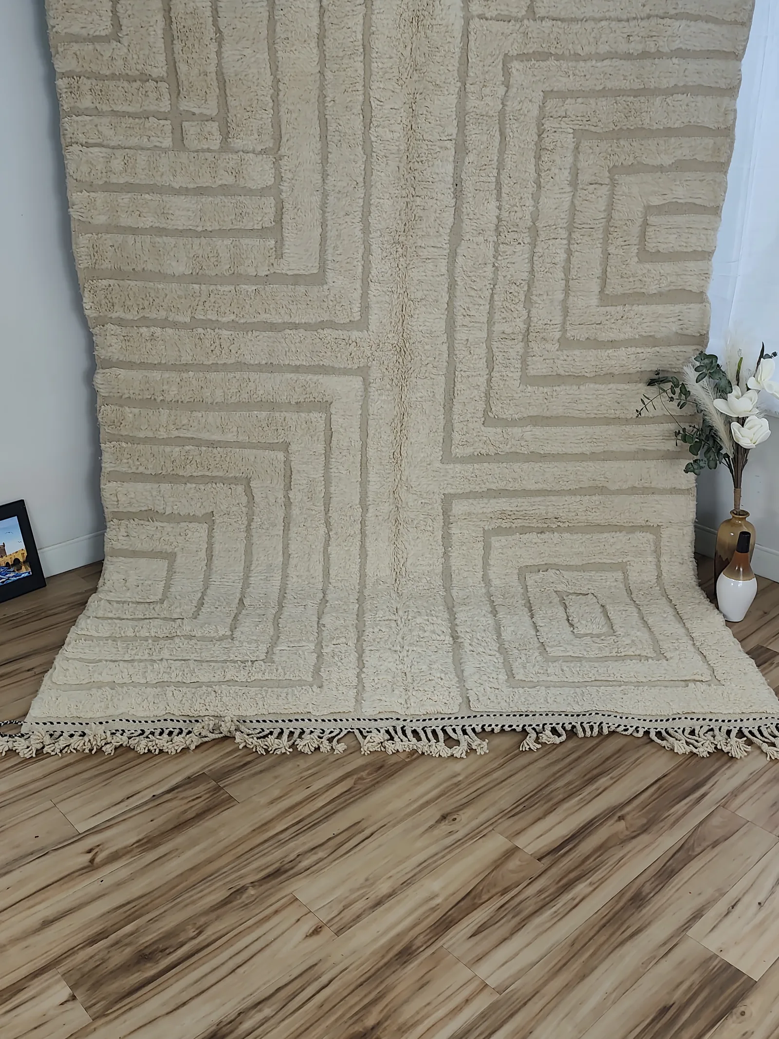 Latifa — hung from a rail, seen from the side, hand-knotted wool, medium pile, sculptured/carved, view 4 of 21
