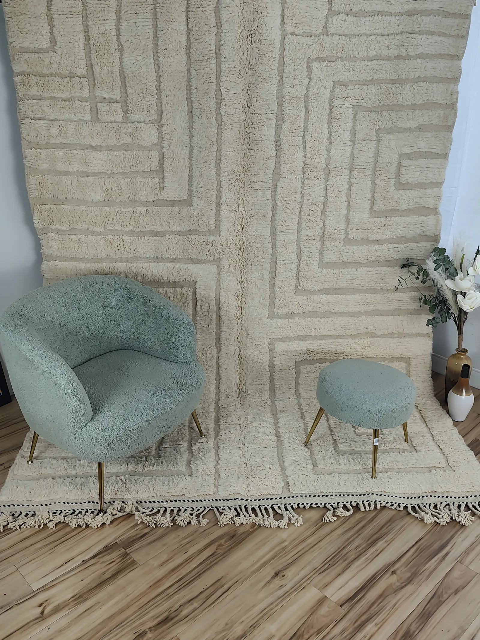Latifa — a chair and stool on the rug, the maze behind, hand-knotted wool in ivory, view 14 of 21