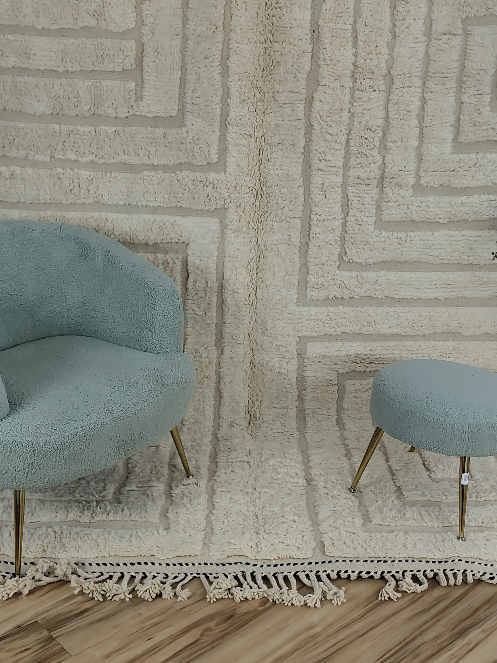 Latifa — a close view of the chair and stool against the maze, a rug that reveals itself slowly, 271 × 200 cm, view 20 of 21