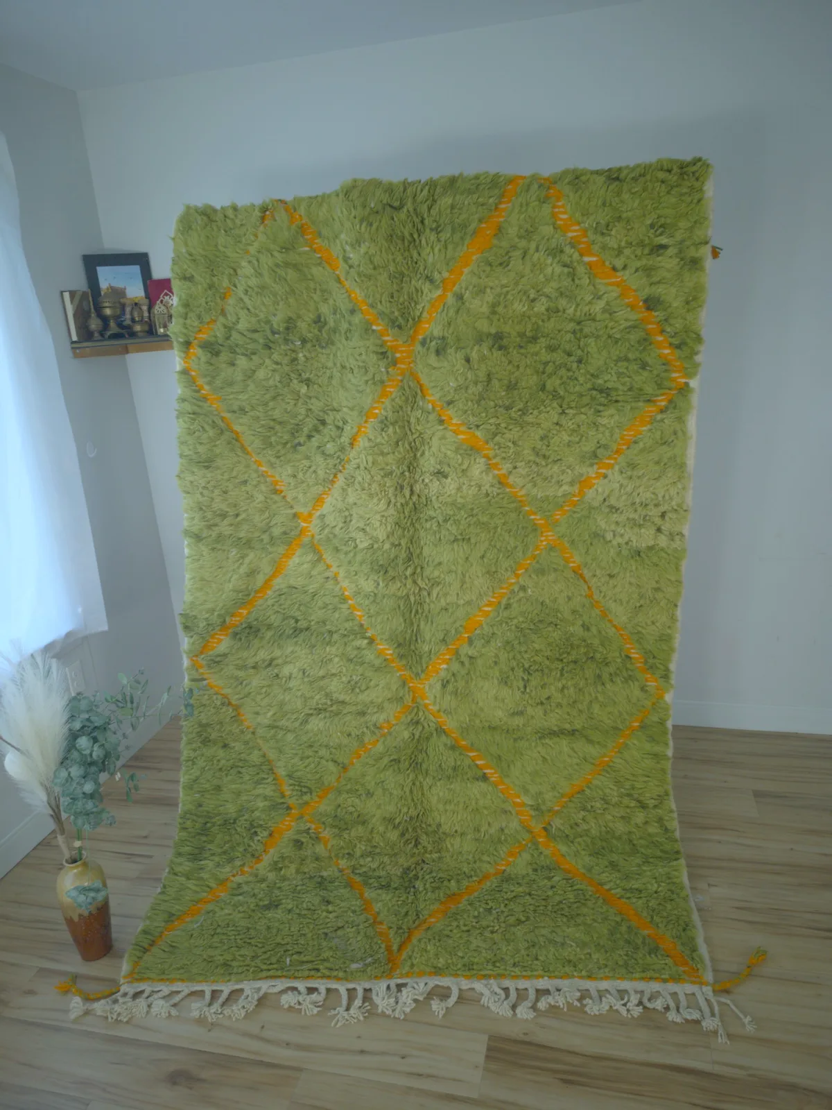 Vivid lime-green shag Beni Ourain rug with bold orange diamond lattice