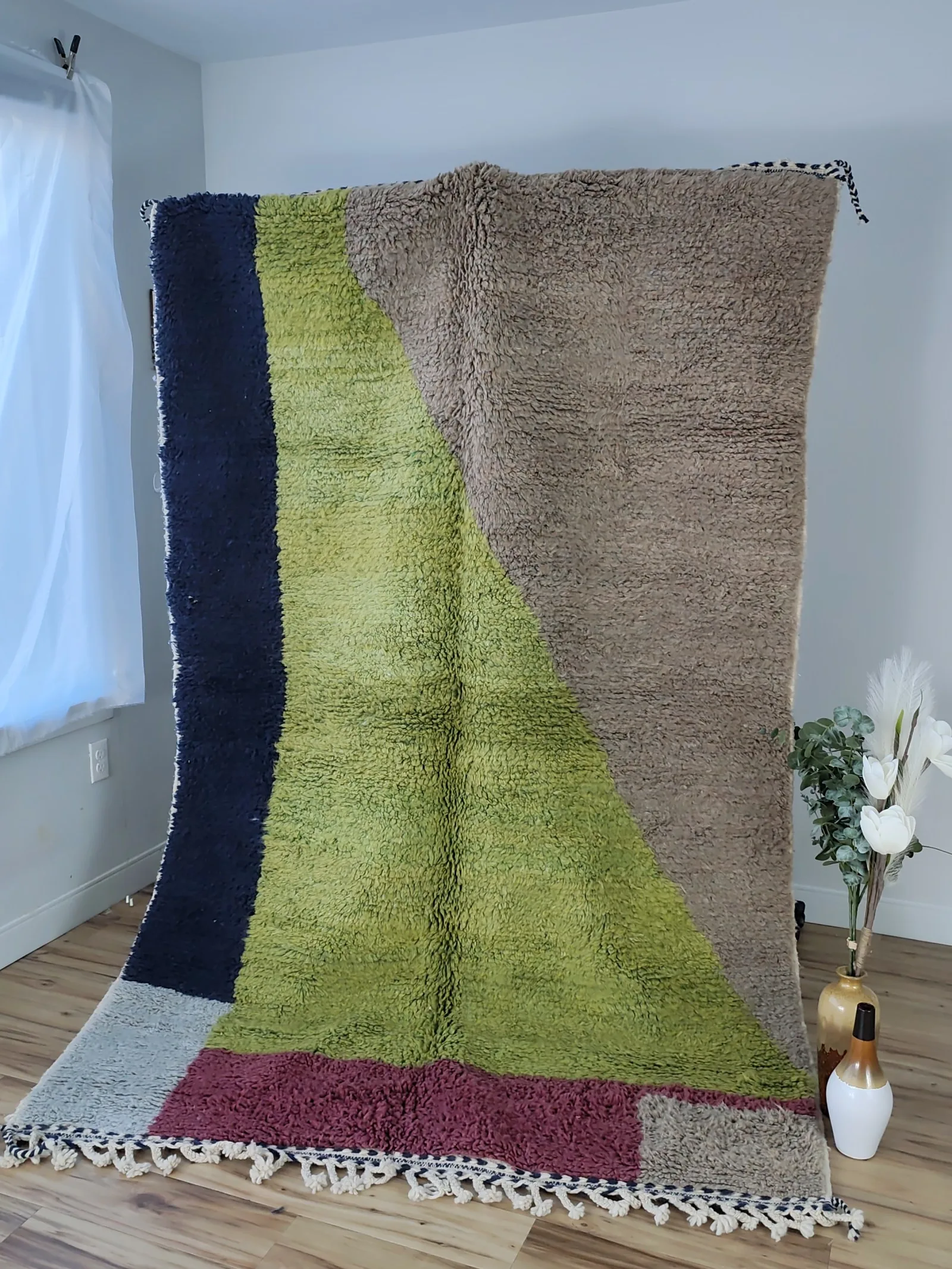 Bold color-block Moroccan rug with navy, lime green, taupe and hot pink geometric fields