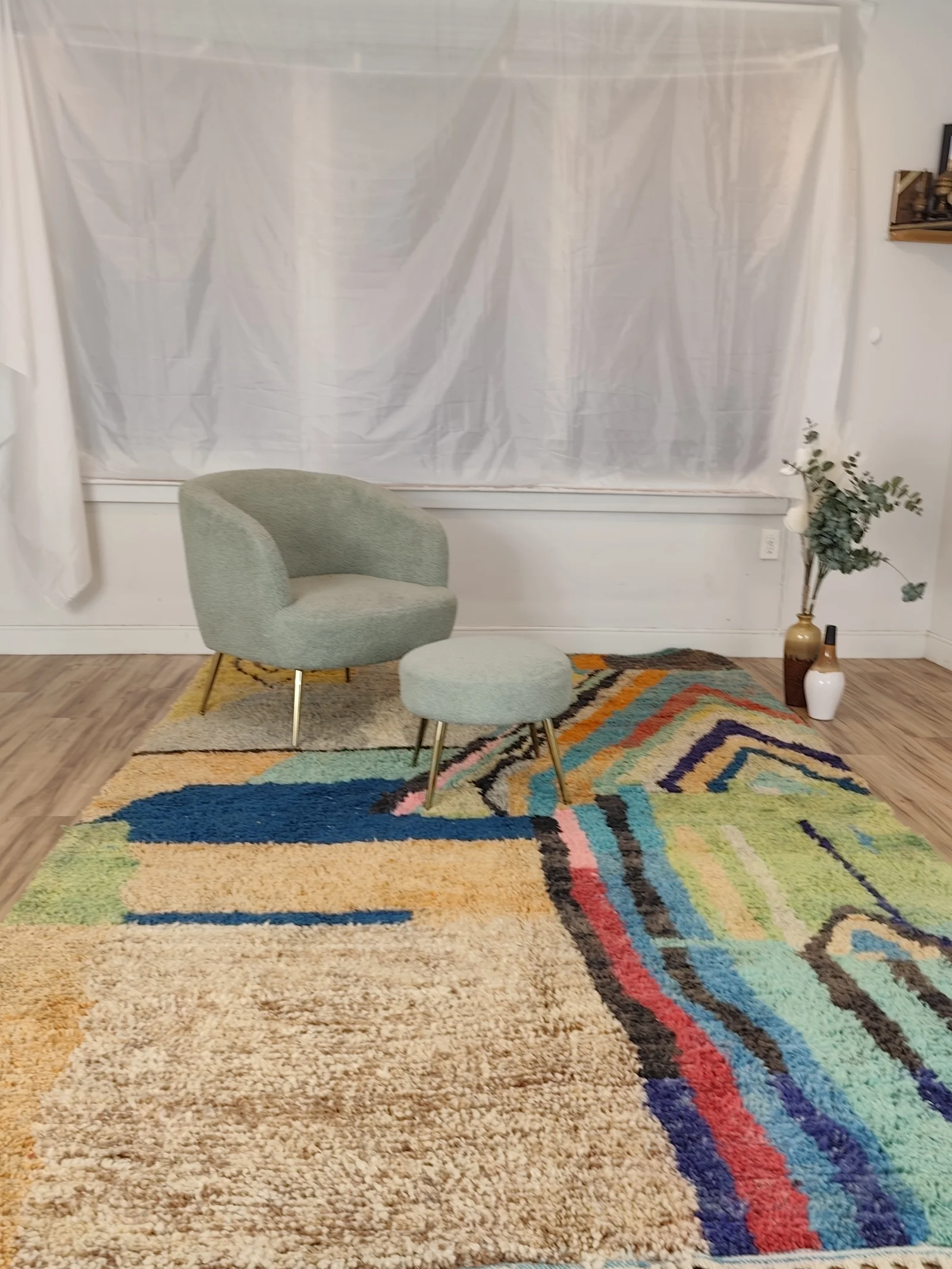 Soukaina — on the floor with a boucle chair and stool by the window, new Boujaad rug handwoven in Morocco, view 5 of 20