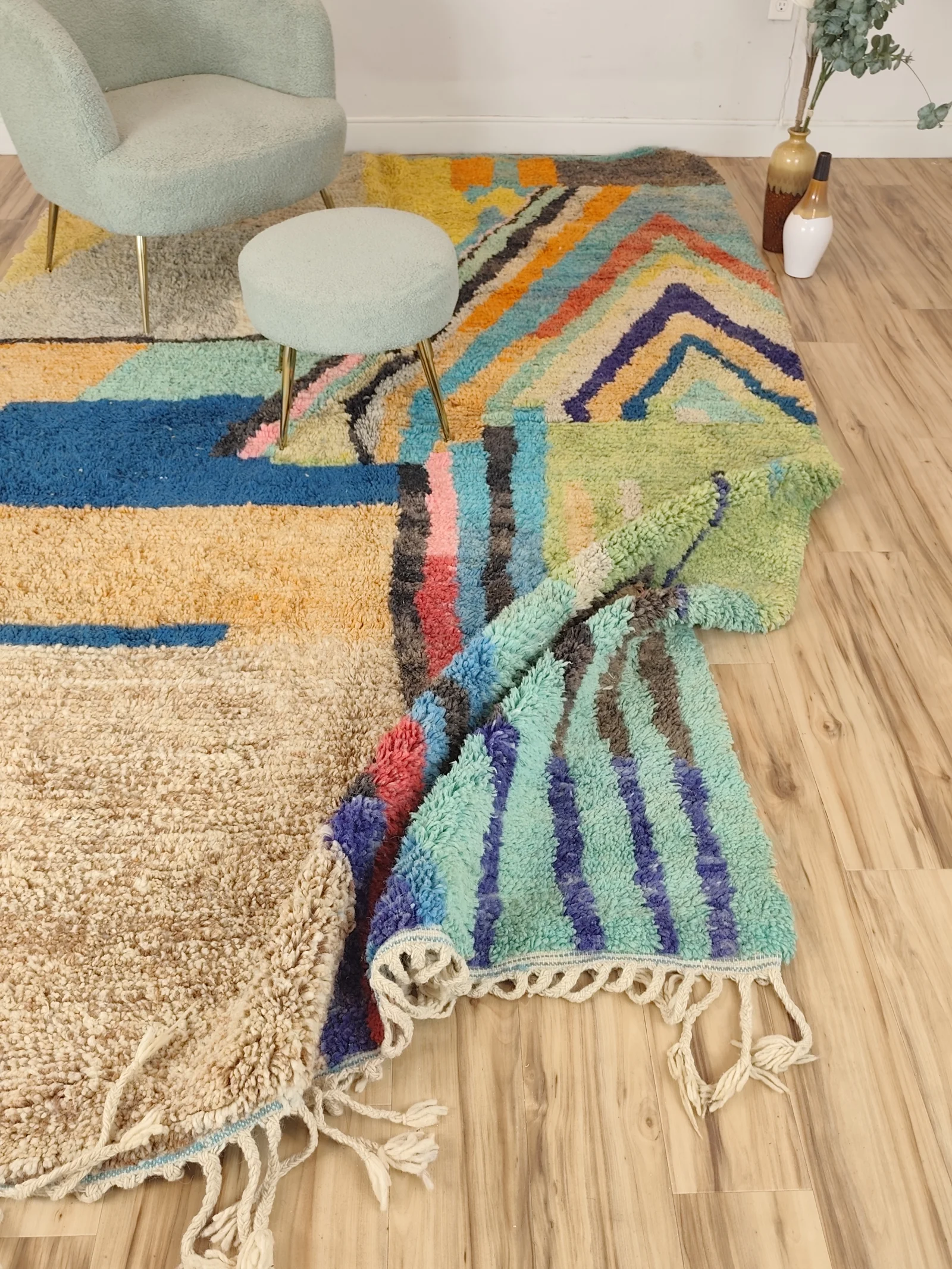 Soukaina — the rug folded back on the floor to show the reverse, 323 × 178 cm, hand-knotted wool, view 9 of 20