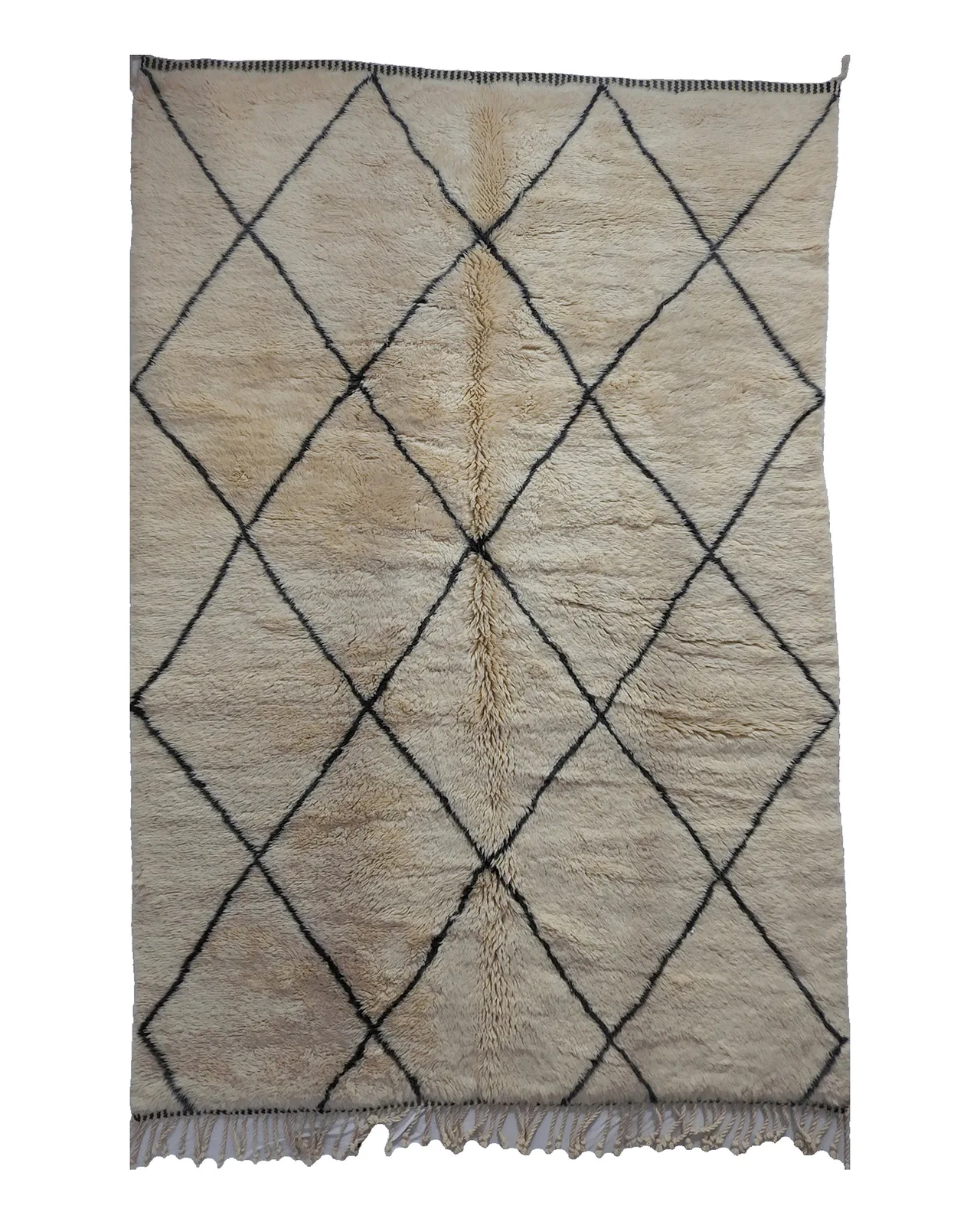 Ivory Beni Mrirt rug with a hand-drawn lattice of dark diamonds across undyed wool