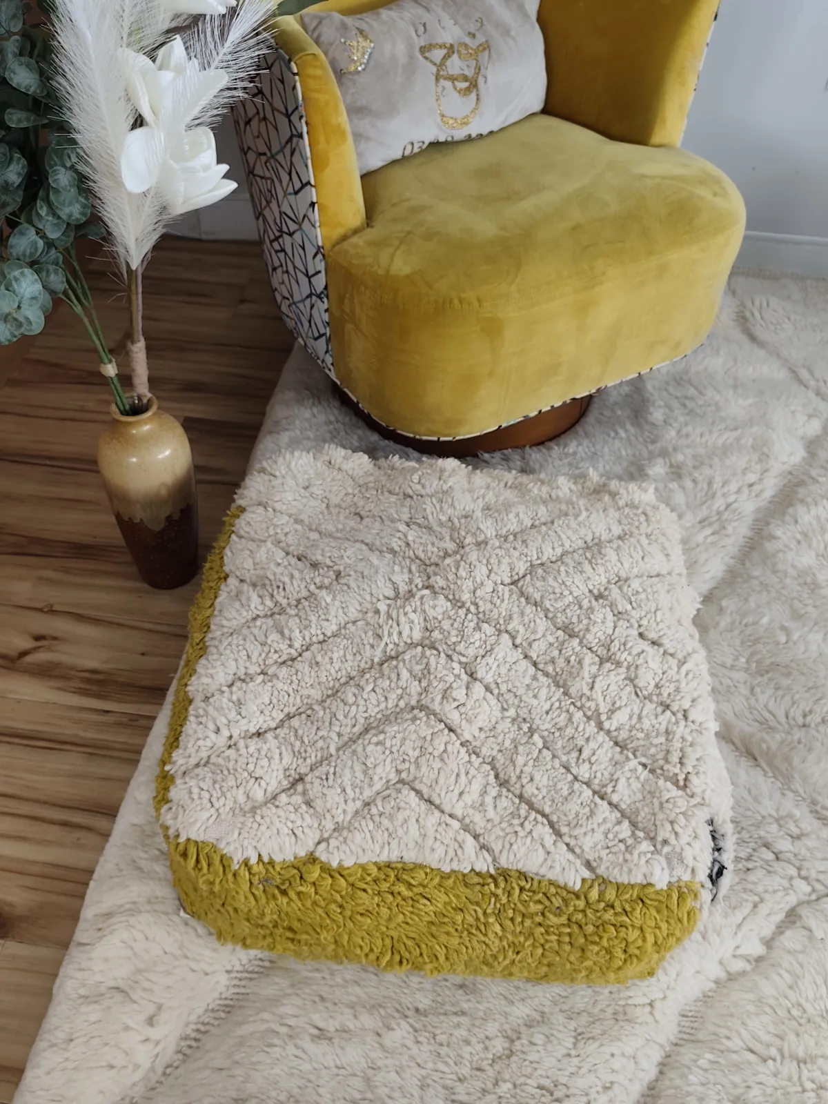 Ayour — mustard & ivory beni ourain pouf, styled beside a mustard armchair, view 6 of 7