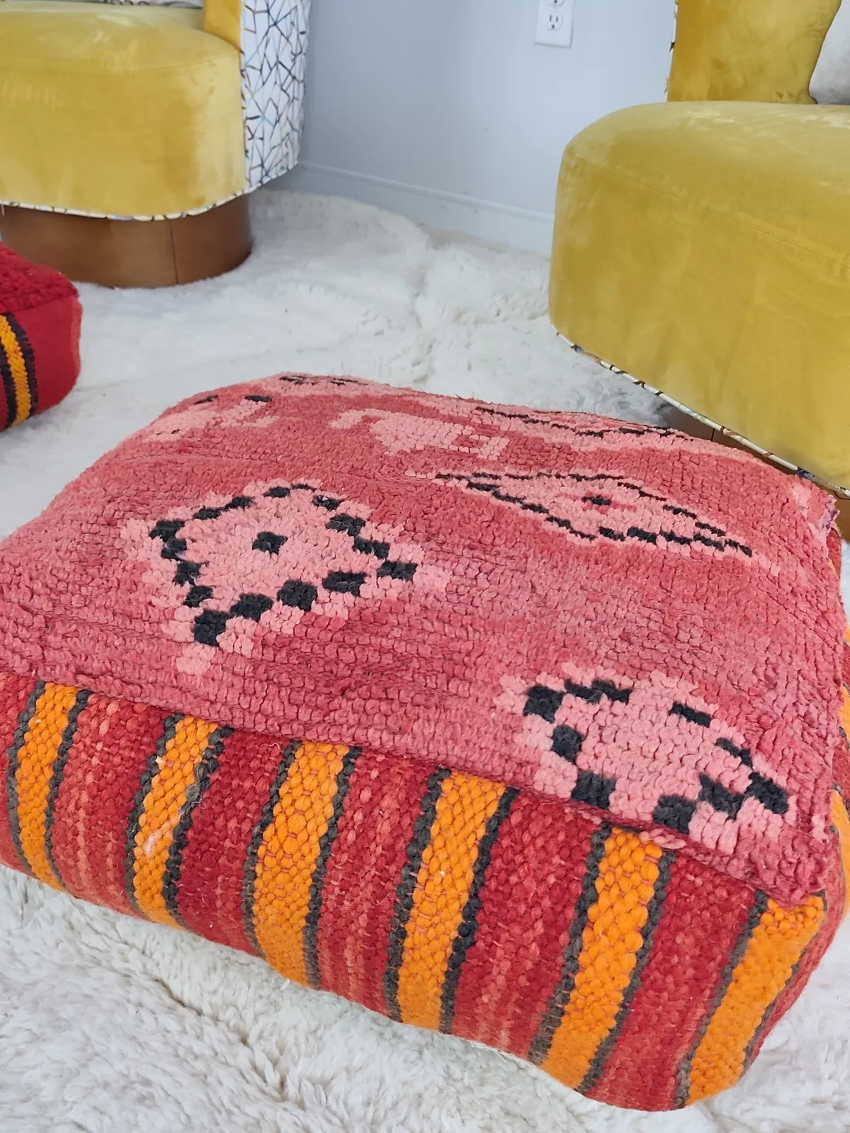 Damya — coral stripe pouf, close view of the wool texture, view 4 of 7