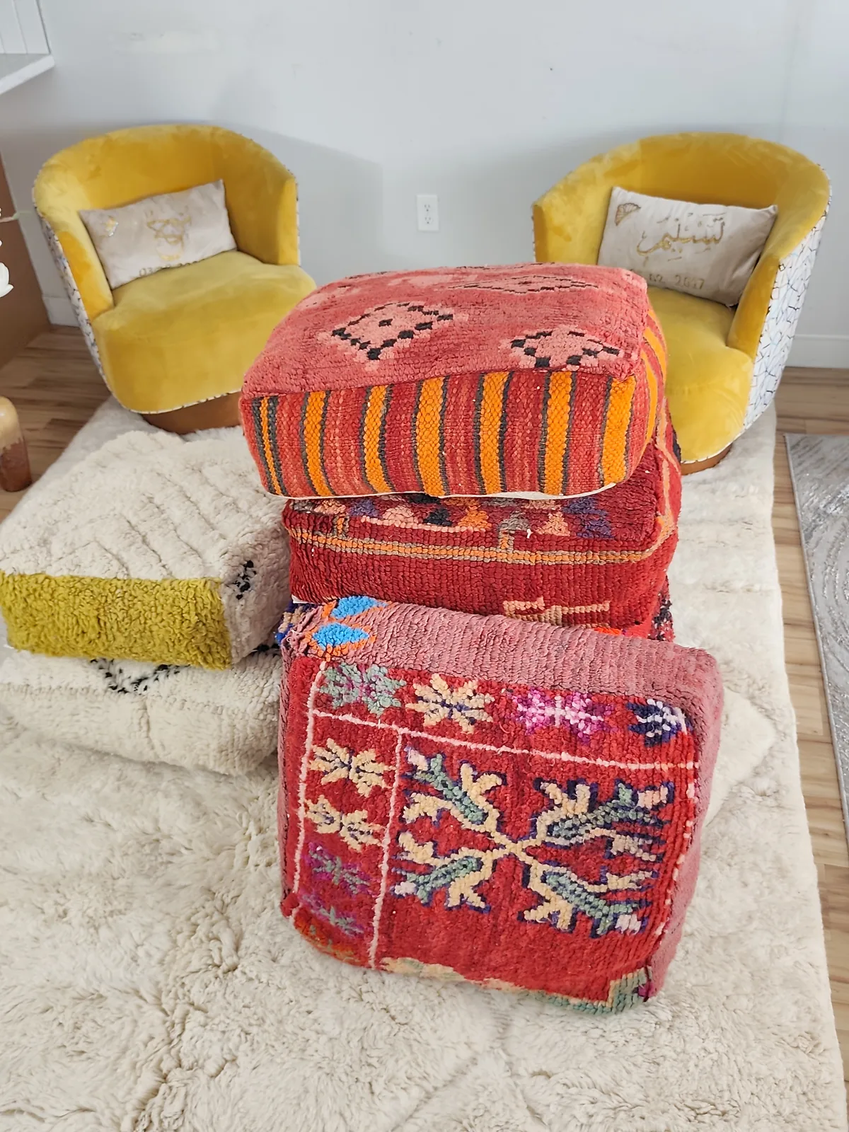 Tinhinan — botanical crimson pouf, in a room setting for scale, view 7 of 8