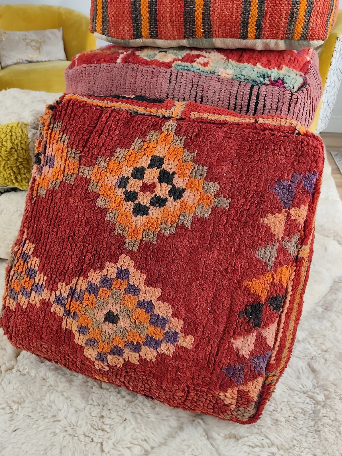 Zohra — amber diamond pouf, angled view showing the depth of the pile, view 2 of 6